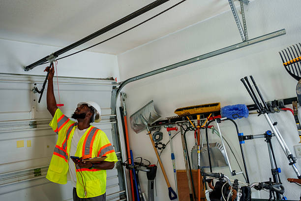 Professional Garage Door technician working in Thompsonville, CT